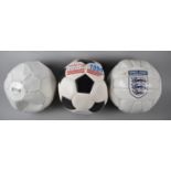 A Collection of Three Footballs to Include World Cup 1994, England and Boss Parfums