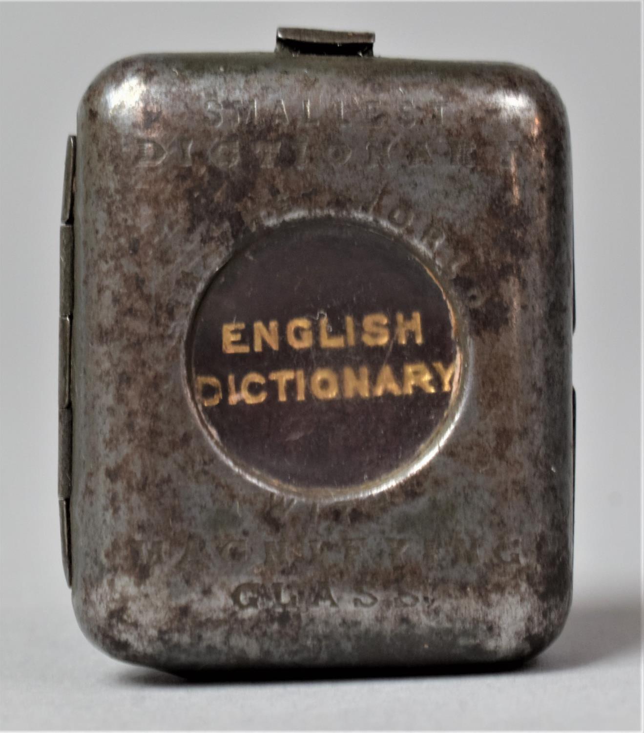 A Novelty "World's Smallest Dictionary", the Case having in Built Magnifying Glass