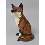 A Beswick Fireside Seated Fox, No.2348