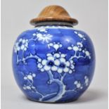 A 20th Century Chinese Blue and White Prunus Pattern Ginger Jar with Double Concertic Blue Mark to