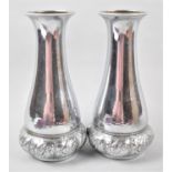 A Pair of Pressed Metal Silver Plated Vases, 26cm high