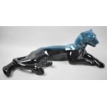 A Glazed Staffordshire Study of a Reclining Lioness, 43cm Long