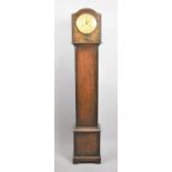 An Edwardian Oak Grandmother Clock with Eight Day Movement