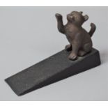 A Modern Novelty Cast Metal Doorstop with Kitten Having Raised Paw Mount, 15cm Long