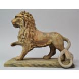 An 18th Century Style Cast Metal Study of a Lion with Paw Raised and Set on Wooden Plinth Base, Tail