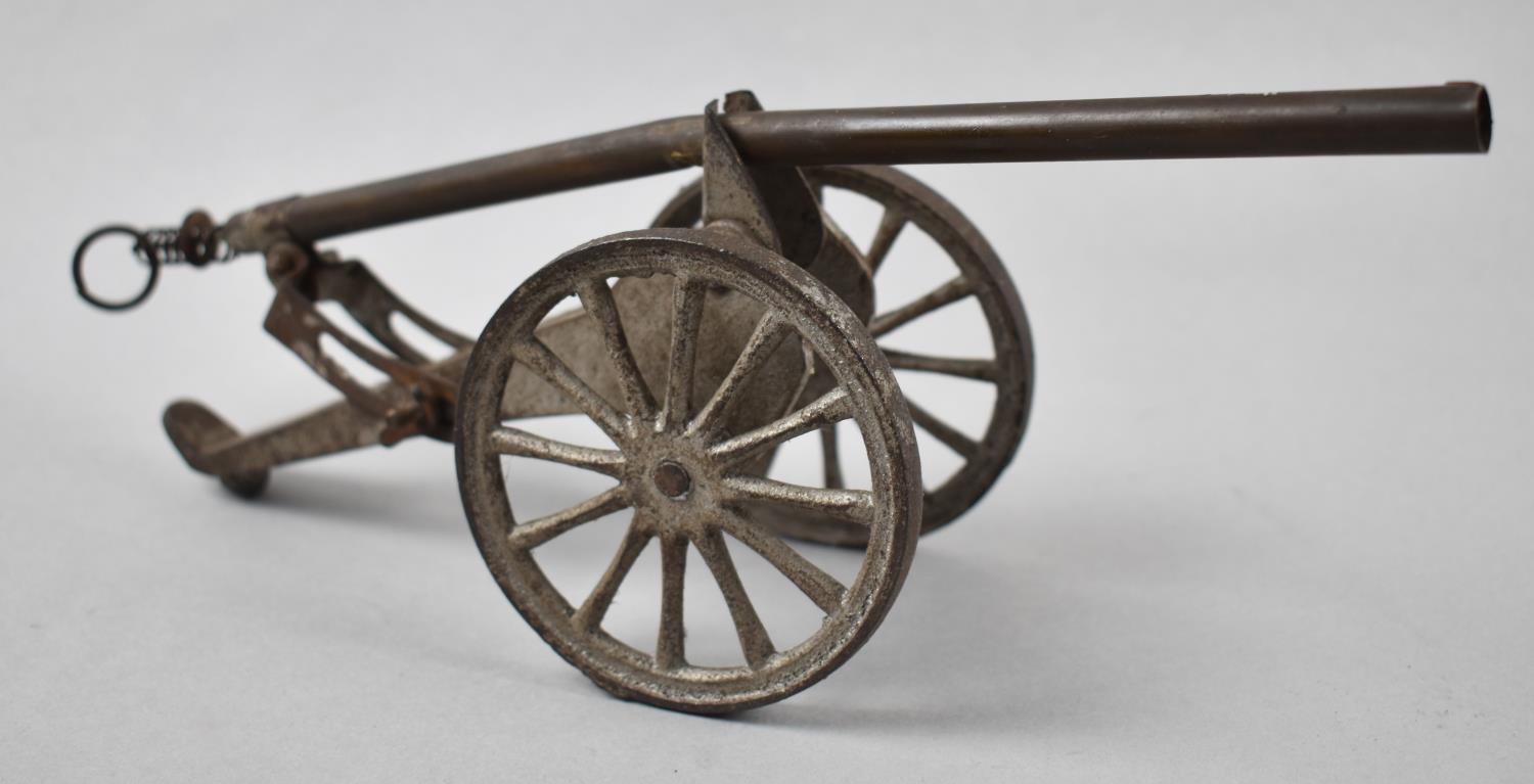 A Vintage Brass and Metal Toy Cannon, 25cm Long