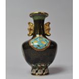 An Oriental Cloisonné Enamelled Two handled Vase with Floral Cartouches, 14.5cm high