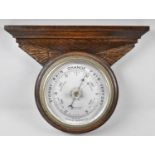 An Art Deco Wall Hanging Oak Framed Circular Aneroid Barometer, 28cm Wide