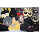 A Collection of Various Guinness Slippers, Coats and Other Guinness Items