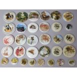 A Collection of Various Reproduction Pot Lids to Include Patum Peperium etc
