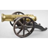 A Heavy Cast Iron and Brass Signal Cannon, 33cm Long