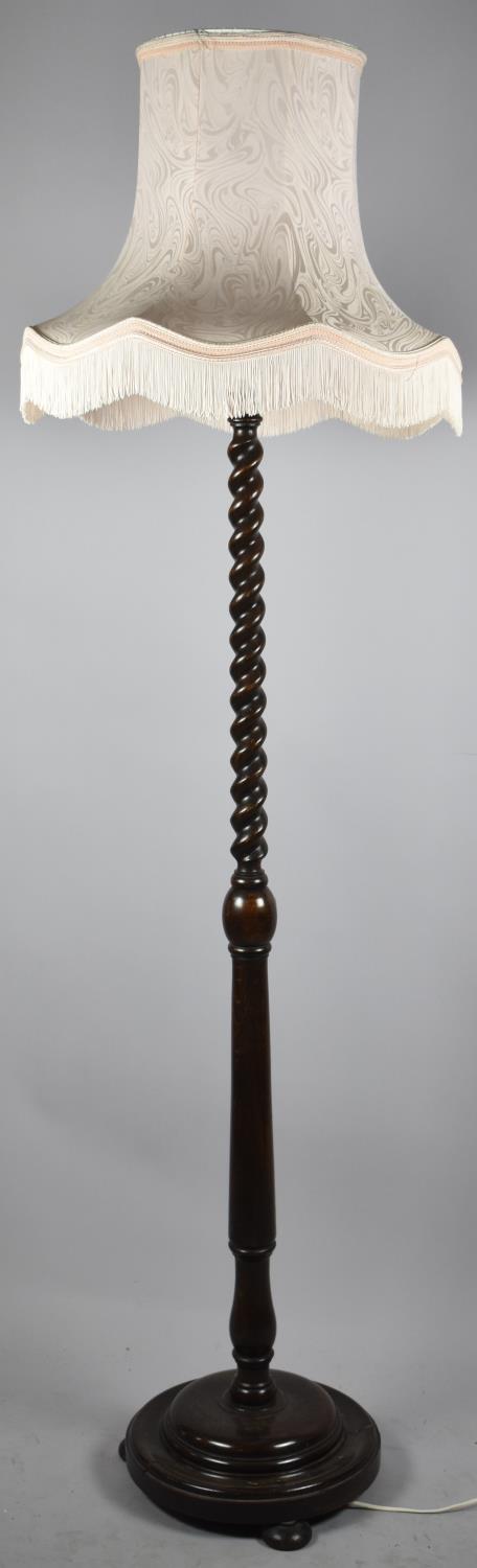 A Mid 20th Century Oak Barley Twist Standard Lamp with Shade