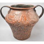 An Interesting Repousse Work Copper Vase with Twin Iron Handles and Decorated In Relief with Lions