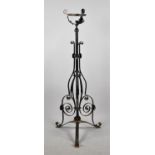 A Late 19th/Early 20th Century Wrought and Iron Rise and Fall Oil Lamp Stand on Tripod Support