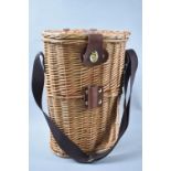 A Modern Oval Leather Mounted Wicker Bottle Carrier, 35.5cm high