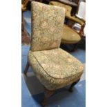 A Mid 20th Century Tapestry Upholstered Nursing Chair on Short Cabriole Supports