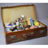 A Vintage Leather Suitcase Containing Various Toys, Mask, Crayons etc