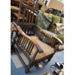 An Edwardian Oak Framed Bobbin Armchair, No Cushions