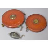 Two Mid 20th Century Leather Cased Tape Measures by Rabone and a Push Button Counting Device
