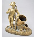 A Late 19th Century French Brass Novelty Smokers Stand in the Form of a Soldier Standing Next to