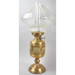 A 20th Century Pressed Brass Oil Lamp with Duplex Controls and Glass Shade and Chimney, Overall