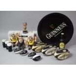 A Collection of Guinness Rugby Figures, Miniature Rugby Balls, Pocket Pundits, Tray Etc