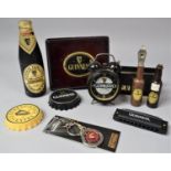 A Collection of Guinness Novelties to Include Bottle Openers, Alarm Clock, Key Ring etc