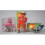 A Collection of Three Clockwork Toys to Include Atomic Robot Man, Chicken and Sparklz