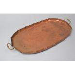 An Early 20th Century Copper Oval Galleried Tray with Brass Carrying Handles and Four Brass Bun