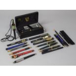 A Collection of Various Guinness Pens and a Pen Set