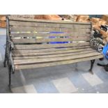 A Cast Iron Ended Garden Bench, In Need of Attention to Wooden Slats, 152cm Wide