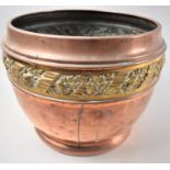 A Mid 20th Century Copper and Brass Jardiniere with Pressed Floral Decoration, 27cm Diameter