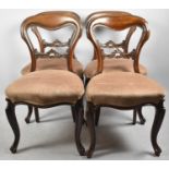 A Collection of Four 19th Century Mahogany Balloon Back Dining Chairs