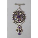 A Silver and Enamelled Cluster Brooch Set with Amethysts in the Hungarian Style
