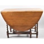 An Oak Barley Twist Barley Drop Leaf Oval Topped Gate Legged Table, 99cm Long