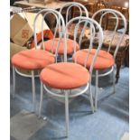 A Set of Four Modern Metal Framed Cafe Style Chairs