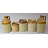 A Collection of Glazed Stoneware Pots and Bottles