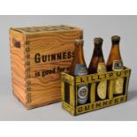 A Collection of Nine Guinness Lilliput Beer Bottles