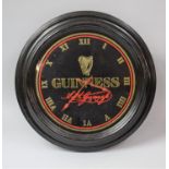 A Circular Reproduction Guinness Advertising Clock, Battery Movement, 40.5cm Diameter