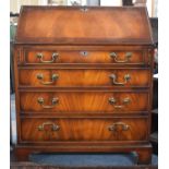 A Mid 20th Century Crossbanded Mahogany Fall Front Bureau with Four Long Drawers to Base and