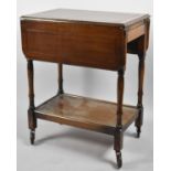 An Edwardian Oak Drop Leaf Trolley, with Stretcher Shelf and End Drawer, 61cm Long