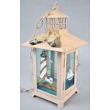 A Modern Metal Lantern Decorated with Butterfly, Sailing Boat and Lighthouses, 30cm high