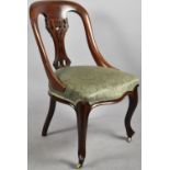 A Late Victorian/Edwardian Mahogany Desk Chair with Serpentine Front and Pieced Splat