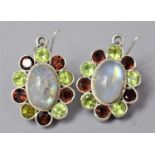 A Pair of Silver Earrings Mounted with Moonstone, Peridot and Garnet or Ruby