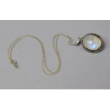 A Silver and Moonstone Oval Pendant on 44cm Silver Chain