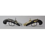 Two Mid 20th Century Novelty Lighters in the Form of Percussion Cap Pistols, (We are Unable to