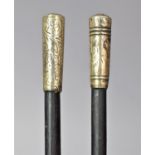 Two Ebonised Swagger Sticks or Batons, One with Silver Top, 62cm and 55cm Long