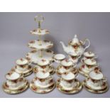 A Royal Albert Teaset to comprise Teapot, Nine Cups, Eight Saucers, Eight Side Plates, Pin Dish,