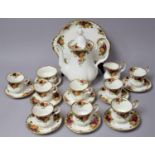 A Royal Albert Old Country Roses Coffee Set to comprise Eight Cans, Nine Saucers, Milk Jug, Sugar