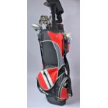 A Set of St. Andrew's Tour Golf Clubs and a Golf Bag